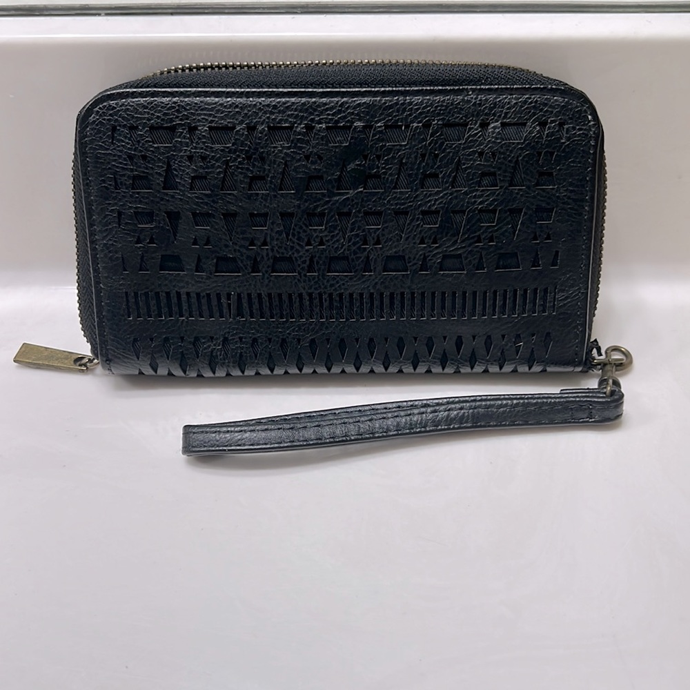 Black wristlet/wallet with cutout design